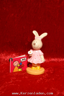 Hasenmädchen mit Blume in der Hand